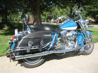 2001 Harley Davidson Road King Classic with custom rider and passenger floor boards, Highway pegs. Rinehart exhaust pipes, an easily removable set of saddlebags and a windscreen (this photo is for example only; please contact seller for pics of the actual motorcycle for sale in this classified)