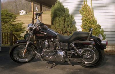 2002 Harley Davidson Lowrider Rider FXDL 1450. Black with red stripes (this photo is for example only; please contact seller for pics of the actual motorcycle for sale in this classified) forward controls