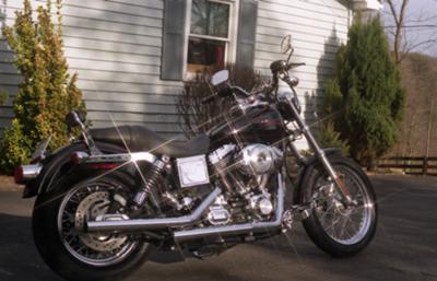 2002 Harley Davidson Lowrider Rider FXDL 1450. Black with red stripes (this photo is for example only; please contact seller for pics of the actual motorcycle for sale in this classified) Vance and Hines exhaust