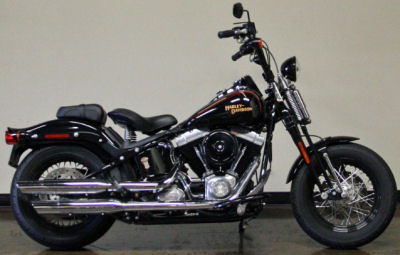 2008 Harley Davidson Cross Bones Softail FLSTSB with black paint color and springer front end
