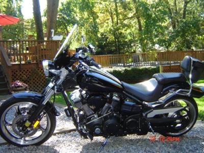2009 Yamaha Raider w Vance and Hines 2 into 1 exhaust pipes, integrated taillight and blinkers and sidemounted license plate holder