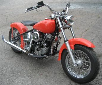 1948 Harley Davidson Panhead Motorcycle with Orange Paint Color and a 4-speed Manual Transmission