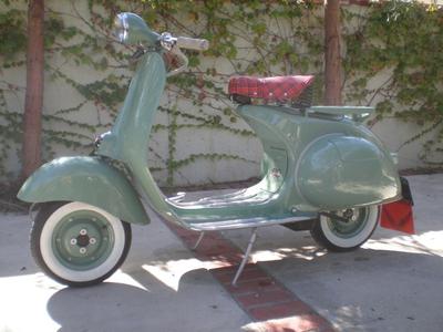 1958 classic restored Vespa scooter, 125cc of refurbished, rebuilt perfection.