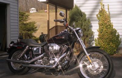 2002 Harley Davidson Lowrider Rider FXDL 1450. Black with red stripes (this photo is for example only; please contact seller for pics of the actual motorcycle for sale in this classified)