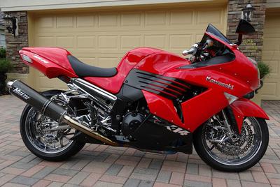 2006 Kawasaki Ninja ZX14 with red and black paint color combination (this photo is for example only; please contact seller for pics of the actual motorcycle for sale in this classified)