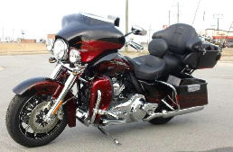 2011 Harley Davidson CVO Ultra Classic Electra Glide FLHTCUSE6 with a Black Ember Rio Red paint color and Screamin' Eagle Motor