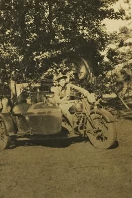 A Picture of My Dad on His Motorcycle in 1940.  Is it a Harley or?? 