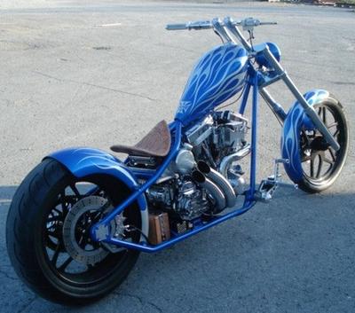 Jessie James West Coast Chopper with Electric Blue and Silver Color Paint Job with Flames Fender and Fuel Tank Graphics with Iron Cross Design for sale by owner 