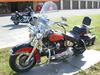 1993 HARLEY DAVIDSON HERITAGE SOFTAIL FLSTC with a retro orange and black motorcycle paint color scheme