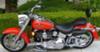 Red, Custom 1998 Harley Davidson Fatboy w Thunder Header Exhaust, Running Lights in Front, Chrome Uppers and Lower Belt, Braided Cables, Extra Seat, Sissy Bar, Arlen Ness Wheels, Highway Floor Boards