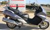 2007 Honda Silver Wing Motor Scooter w dark silver metallic color, a Corbin motorcycle seat and tall windshield (this photo is for example only; please contact seller for pics of the actual motorcycle for sale in this classified)