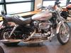 2008 Harley Davidson XL1200C Sportster 1200 Custom with Pewter Pearl paint color option and pinstripes (this photo is for example only; please contact seller for pics of the actual motorcycle for sale in this classified)