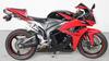 Red and Black 2009 Honda CBR600RR with aftermarket exhaust system and alarm system