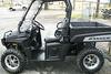 Black 2009 Polaris Ranger 700 Limited Edition and has an extreme bumper, a 3500LB winch (both the company brand), a flip windshield, top, SS chrome wheels and maxxis bighorn tires.  NOT the Ranger for sale in this ad