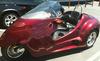 Custom 2009 Thoroughbred Motorsports Stallion Trike with Ford Focus Motor and a dark red black cherry paint color