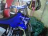 Blue and White 2009 Yamaha YZ 250 2 Stroke Dirt Bike w Renthal fatbars (this motorcycle is for example only; please contact seller for pics of the actual bike for sale)
