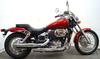 CUSTOM 2003 Honda Shadow Spirit  for Sale w red paint color, chrome accents and twin, liquid cooled, 750cc, four stroke engine with a chain drive.