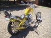 back to front view of the 2001 custom chopper motorcycle with bright yellow paint
