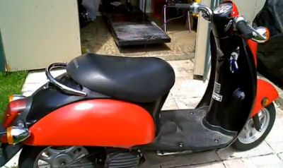 2005 Honda Metropolitian Scooter in red and black