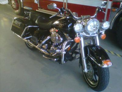 Black 2006 Harley Davidson Road King FLHRI