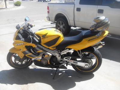 Yellow and Gray 2006 HONDA CBR600 F4i (this photo is for example only; please contact seller for pics of the actual motorcycle for sale in this classified)