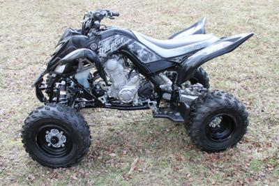 2011 Yamaha Raptor 700 (this motorcycle is for example only; please contact seller for pics of the actual quad for sale)