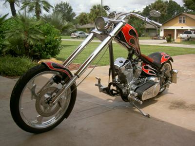Custom Harley Chopper Exotix Cycle and Motorwerkx custom-built Harley Davidson chopper with a 250 rear tire, Billet wheels, a 124 ci S+S engine,an exposed drive belt and a digital speedometer