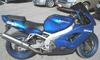 1999 Kawasaki Ninja ZX9 900 CC MOTORCYCLE with blue paint color and aftermarket exhaust system