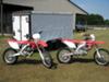 Red and White Honda CRF 250 X for Sale &  Honda CRF 450 X (this photo is for example only; please contact seller for pics of the actual dirt bike for sale in this classified) 