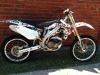 not too good of a pic of the 2005 Honda CRF450r but call for questions