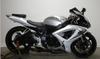 white and silver 2006 Suzuki FSX-R GSXR 1000  w in the rear and has an AKRAPOVIC EXHAUST with DYNOJET POWER COMMANDER (this photo is for example only; please contact seller for pics of the actual motorcycle for sale in this classified)