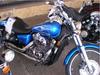 2008 Honda Shadow VT750 Spirit with blue paint color and flames art on the fuel tank.