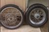 A brand new 180x16 rear wheel and tire spoked avon tire